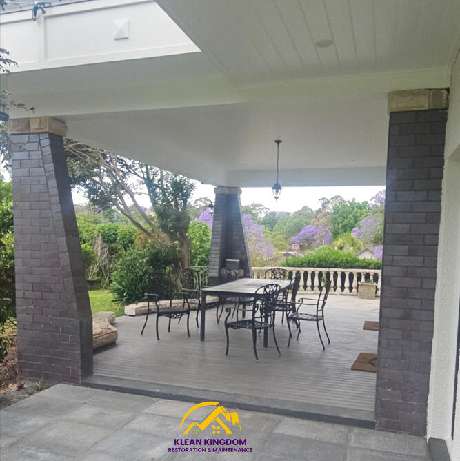 Heritage paint stripping completed Hunters Hill Sydney — restored brick pillars in outdoor entertaining area