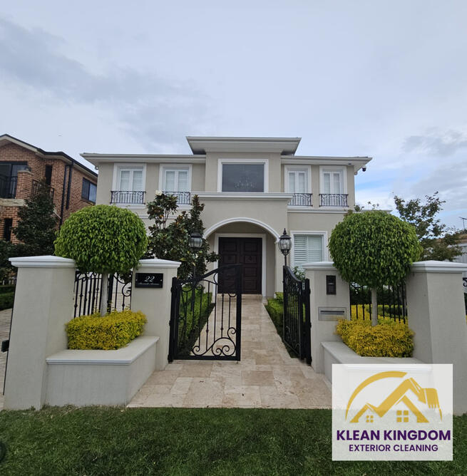 Pre-sale exterior clean of a two-storey rendered home — driveway, house wash and fencing transformed by Klean Kingdom, result exceeding estimates